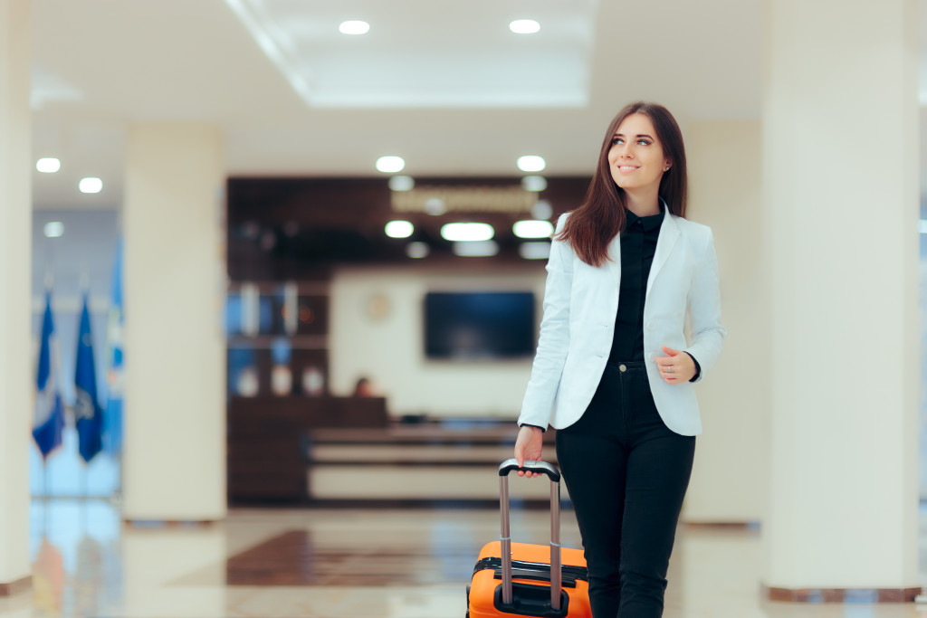 woman going to hotel for staycation