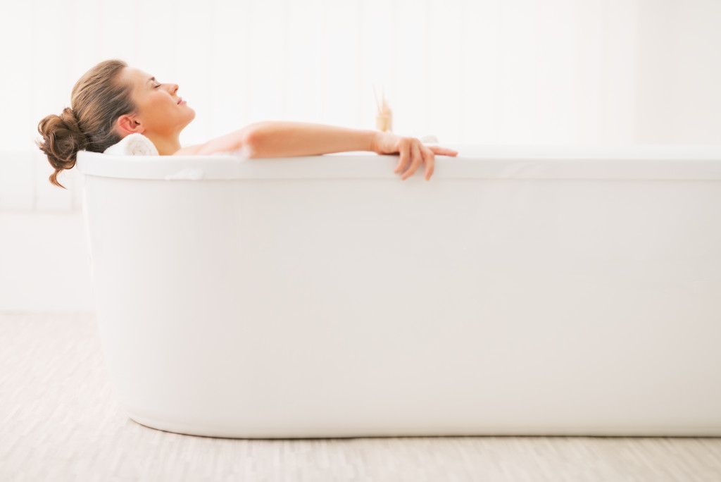 woman relaxing in the bathtub