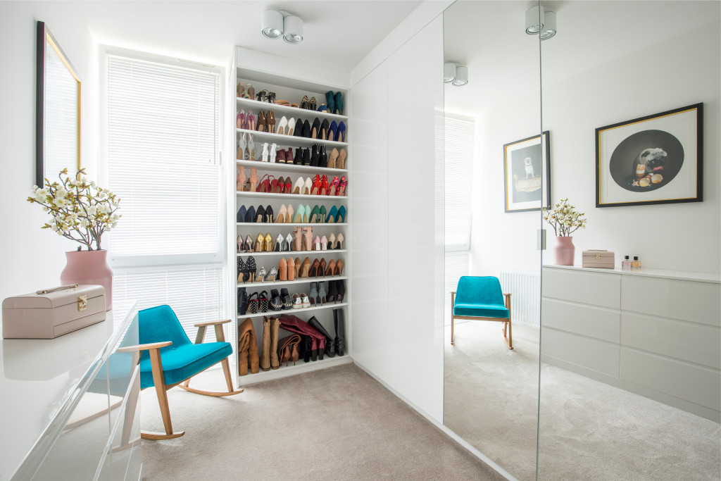 Sliding cabinet attached to wall