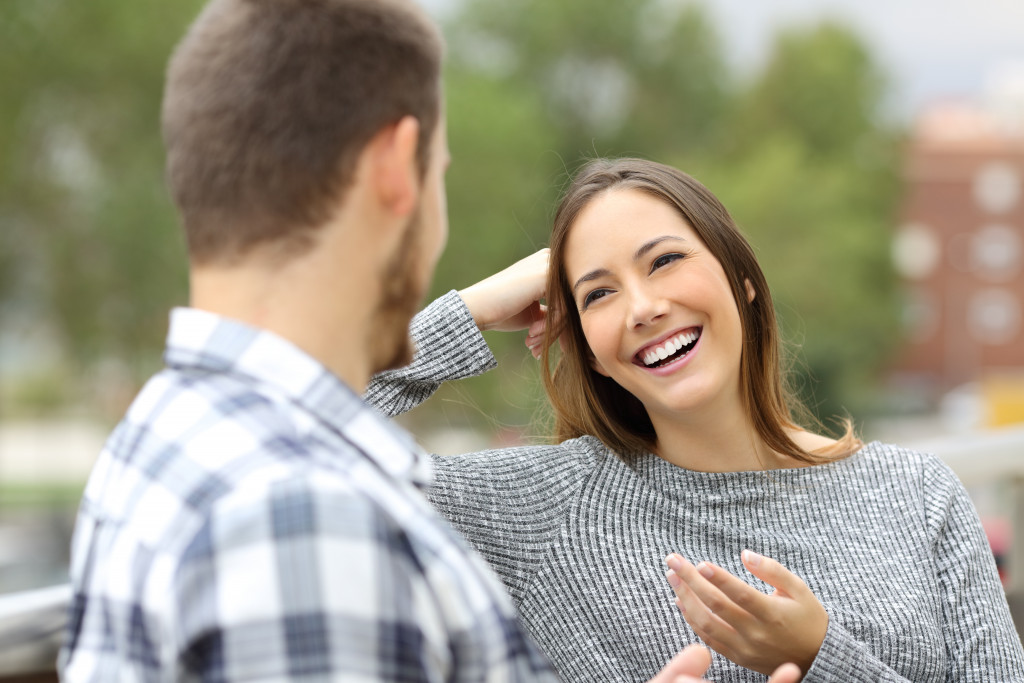 A couple talking and laughing together