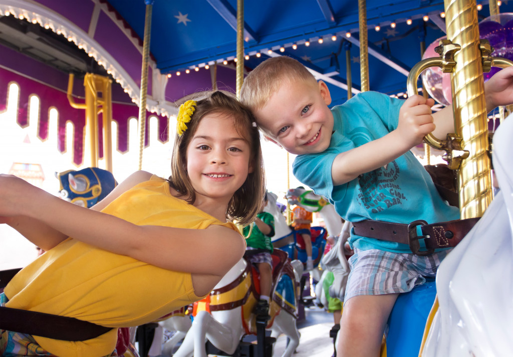 Kids having fun in amusement park