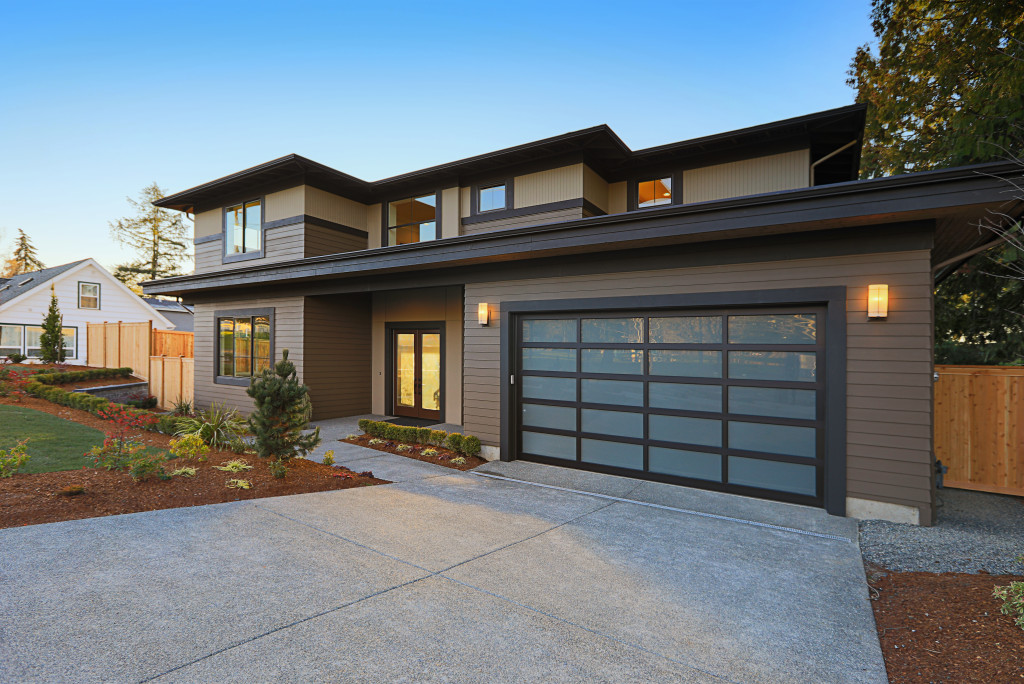 modern home exterior furnished with modern garage
