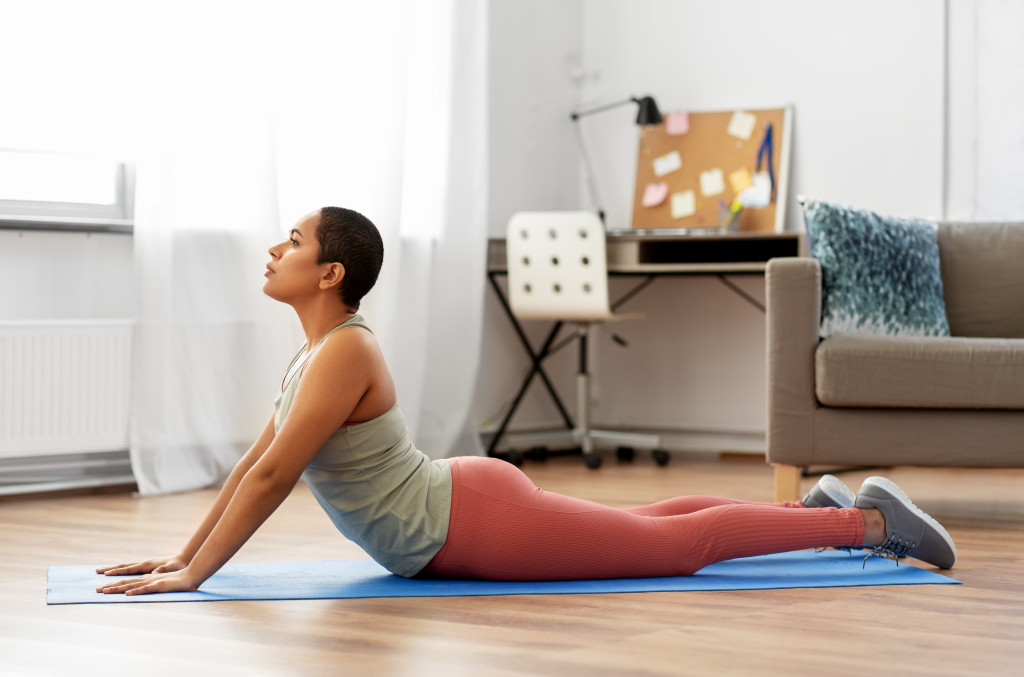 Taking a break from work doing yoga