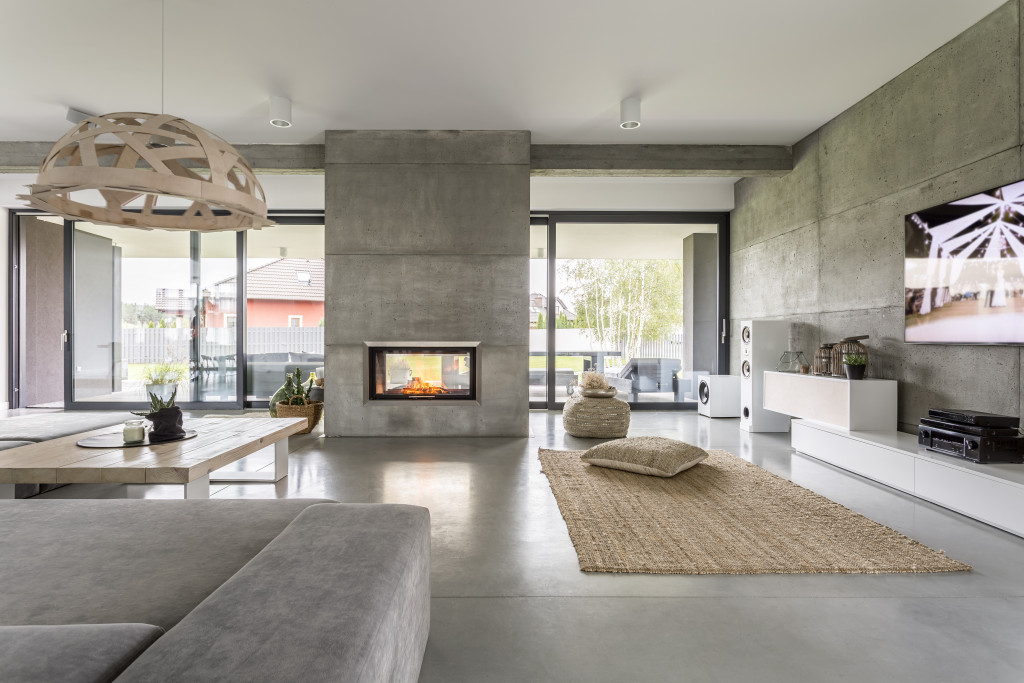 modern minimalist home interior with fireplace and area rug